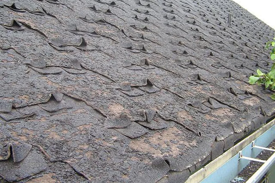 Aged deteriorated shingles requiring complete tear-off and roof replacement in Pasadena CA