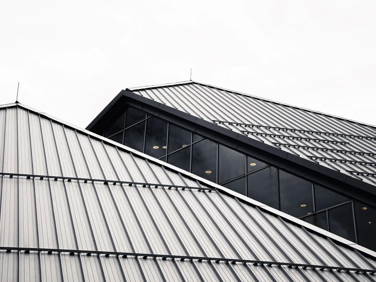 Modern standing seam metal roof panels on Pasadena commercial facility