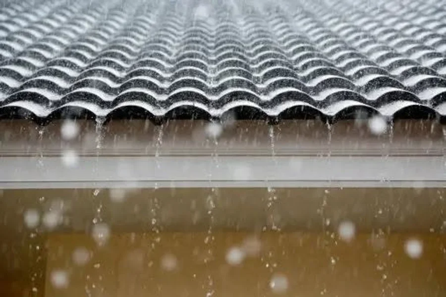 Eaves and drainage flow inspection during storm conditions in Pasadena CA